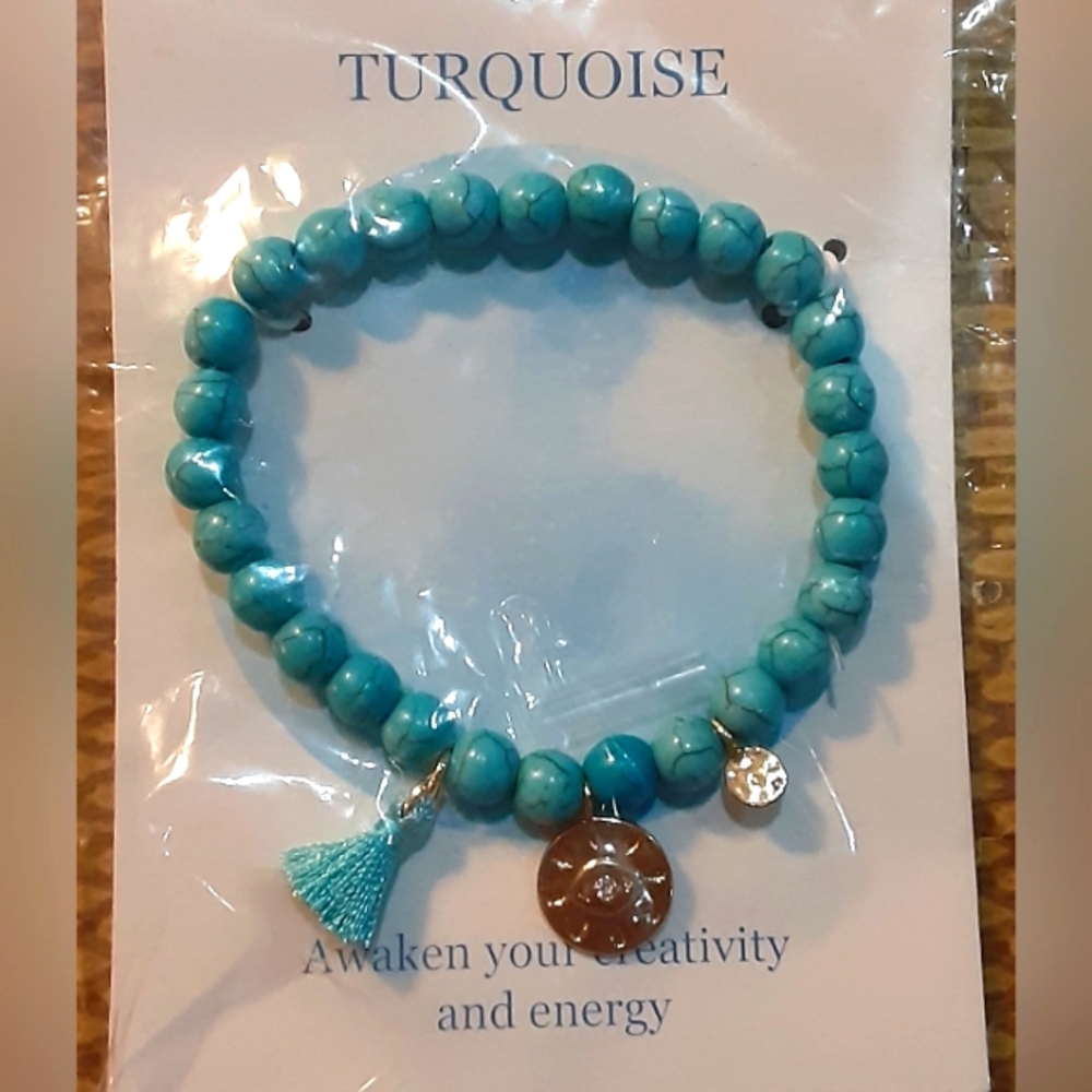 Turquoise semi-precious beaded bracelet with gold charm